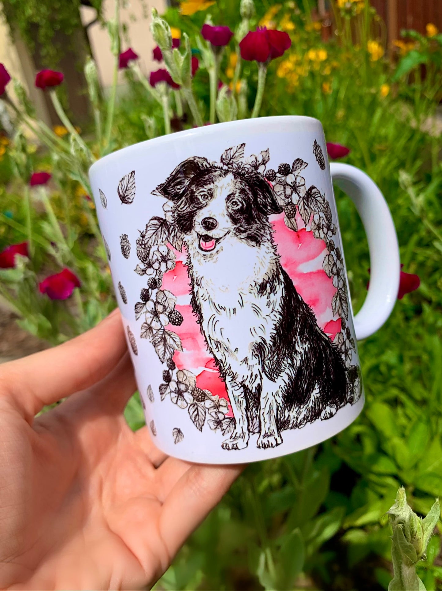 Border collie kutya bögre - ülő Border Collie és Rózsaszín gyümölcsös háttérrel